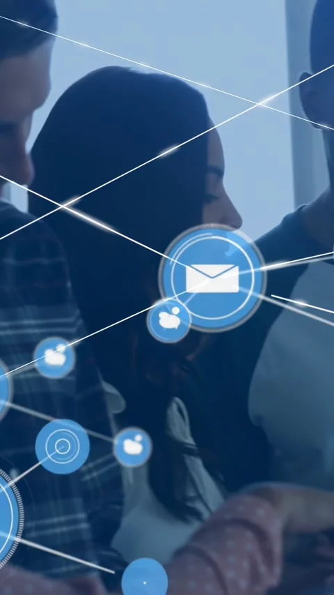 Colleagues tapping tablet, activating email node, expanding user icons, linking Video stock 332506867