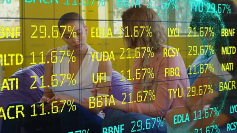 Colleagues tapping tablet and writing note causing percentage codes updating for Stock Footage 314848270