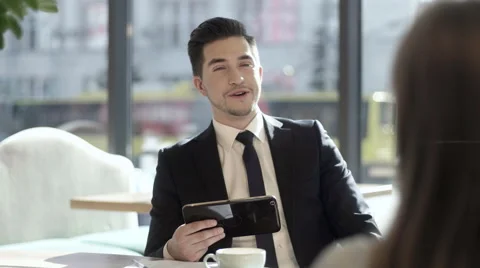 Colleagues Using Digital Tablet at the Meeting Stock Footage 63305958