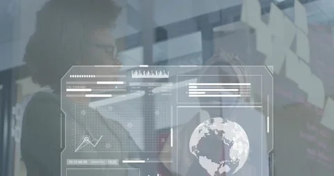 Colleagues using handheld device sliding modules on transparent interface Stock Footage 328010960