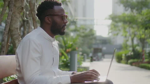 Colleagues Using Tablet and Speaking in Outdoor Cafe Stock Footage 234969664