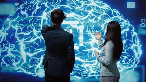 Colleagues using virtual reality technology and AI systems Foto stock
