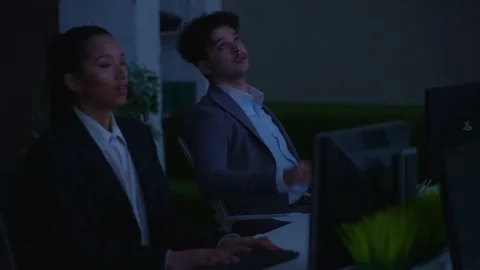 A colleagues work in the office, the lights and electricity are turned off Stock Footage 233717237