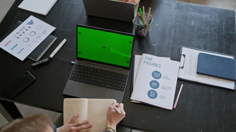 Colleagues Working with Papers and Laptops at Office Table, Top View Stock Footage 335754232