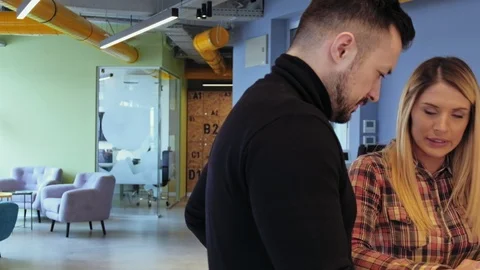 Colleagues working seriously on a project Stock-Footage 94833936