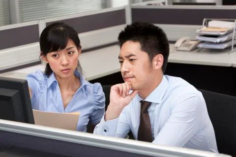 Colleagues Working Together Stock Photos