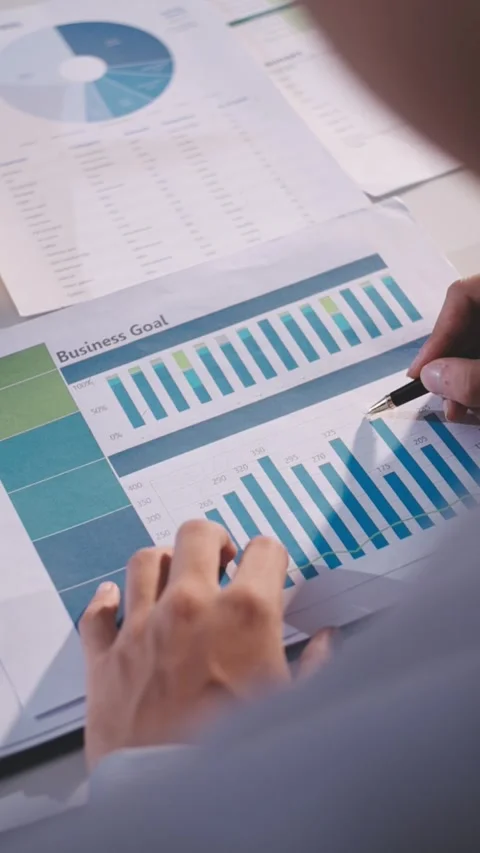 Colleagues working together pointing at business documents during meeting. Stock Footage 344919295