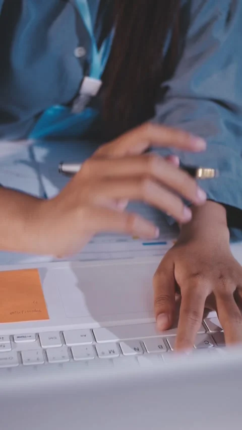 Colleagues working together pointing at business documents during meeting. Stock Footage 344919484