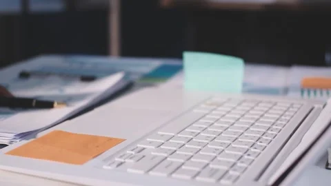 Colleagues working together pointing at business documents during meeting. Stock Footage 344919643