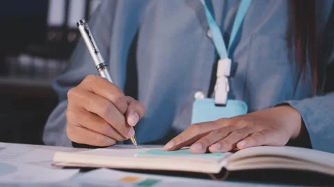 Colleagues working together pointing at business documents during meeting. Stock Footage 344920030