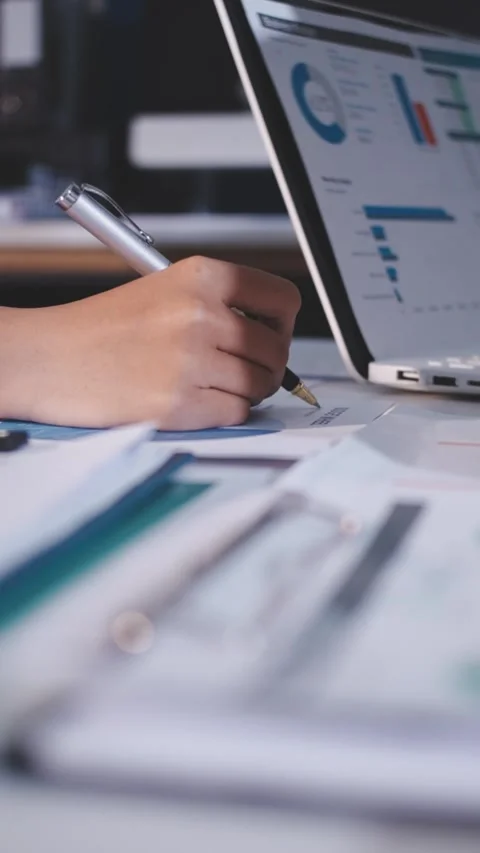 Colleagues working together pointing at business documents during meeting. Stock Footage 344921071