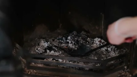 Collecting ash from burner Stock Footage 157999442