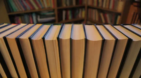 Collecting books Stock Footage 35574058