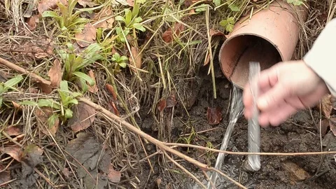 Collecting drain pipe water sample with test tube 動画素材 102060629