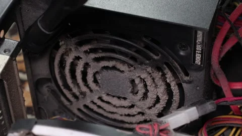 Collecting dust from a computer power supply fan grill Vídeos de archivo 304809921