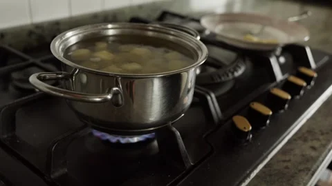 Collecting ready gnocchi from a pot Stock Footage 314857914