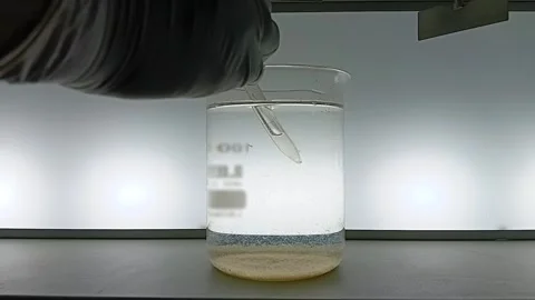 Collecting Treated Water Samples After Jar Test - Quality Analysis Stock Footage 326168301
