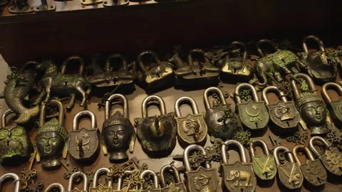 Collection of Antique Brass Padlocks and Metal Tools in Dubai Souk Stock Footage 322985451