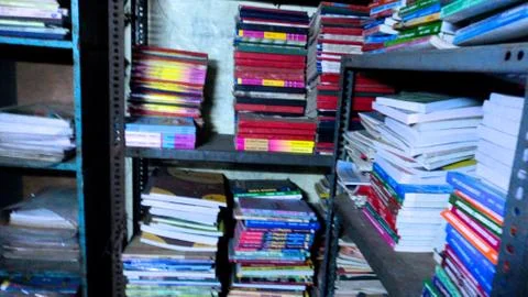 Collection of Books in a Rack Stock Photos