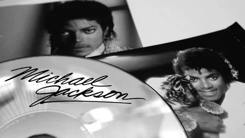 Collection of CD covers and insert by MICHAEL JACKSON Stock Footage 201341605