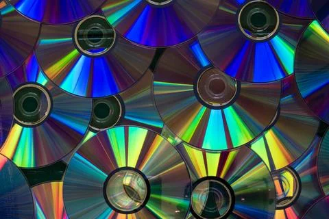 A collection of CDs with a rainbow effect. 1 Stock Photos