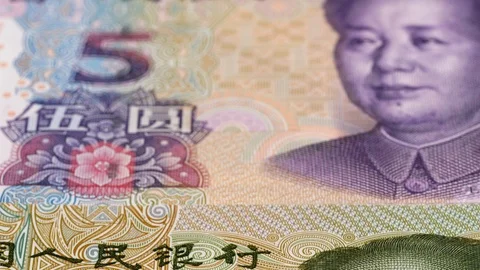 Collection of china yuan notes macro tracking. Slider shot, low angle. 4K Stock Footage 125532659