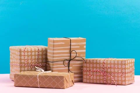 Collection of Christmas present boxes on a light blue background Stock Photos