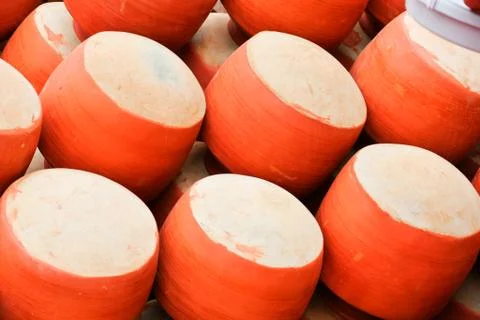 Collection of clay pots made from mud also known as Matka. Stock Photos