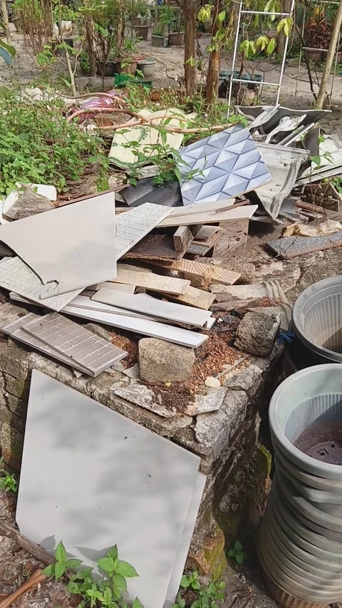 A collection of construction debris, likely from a renovation project Stock Footage 320477716