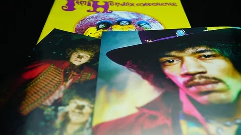 Collection of covers and cd inserts of the American rock guitarist Jimi Hendrix Stock Footage 104576358