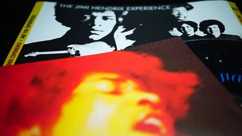 Collection of covers and cd inserts of the American rock guitarist Jimi Hendrix Stock Footage 107619835