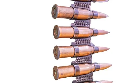 Collection of cylindrical, pointed bullets on metallic strip, varying wear an Stock Photos