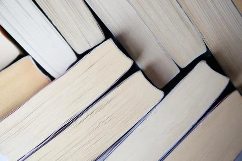 Collection of different books as background, closeup Stock Photos