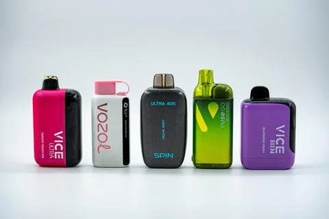 Collection of disposable electronic cigarettes on white background. Toronto, Stock Photos
