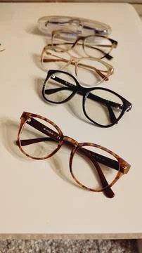Collection Of Diverse Eyeglass Frames Displayed Stock Photos
