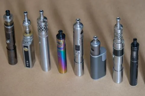 Collection of e-cigarettes or electronic cigarettes for liquid and vaping are di Stock Photos