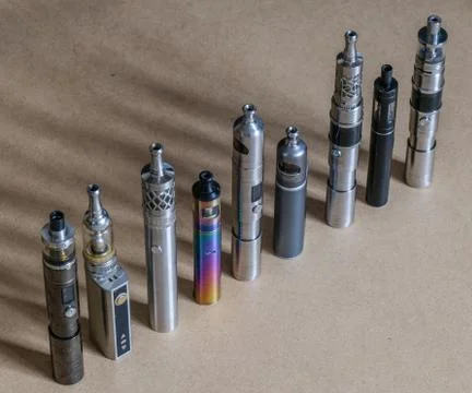 Collection of e-cigarettes or electronic cigarettes for liquid and vaping are di Stock Photos
