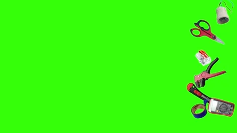 Collection of electrical and repair tools floating on a green background 库存影片 335185818