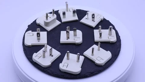 A collection of electrical socket adapters for different countries. Stock Footage 253843926