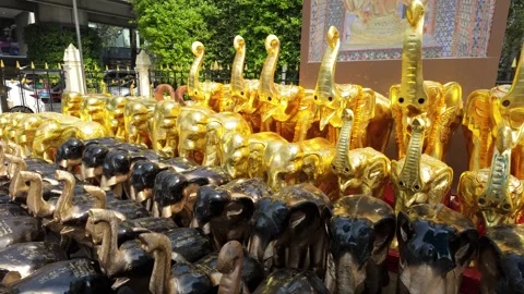 Collection of elephant statues found at The Erawan Shrine temple in Bangkok Видео 314294574