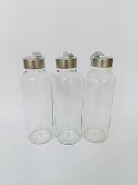 Collection of empty bottles on a white background Stock Photos