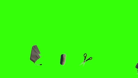 Collection of everyday objects falling against a green screen background Stock Footage 340387098