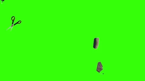 Collection of everyday objects falling against a green screen background Stock Footage 340387100