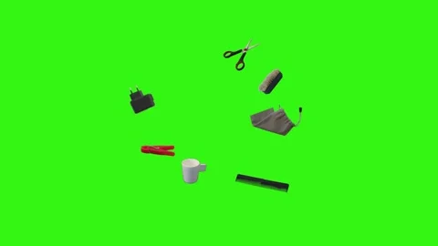 Collection of everyday objects falling against a green screen background Stock Footage 340387112