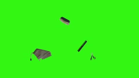 Collection of everyday objects falling against a green screen background Stock Footage 340387114
