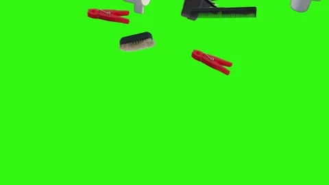 Collection of everyday objects falling against a green screen background Stock Footage 340387133