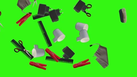 Collection of everyday objects falling against a green screen background Stock Footage 340387142