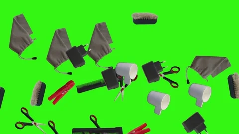 Collection of everyday objects falling against a green screen background Stock Footage 340387146