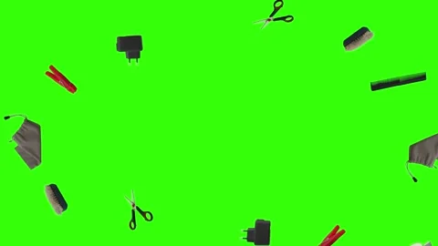 Collection of everyday objects falling against a green screen background Stock Footage 340387161