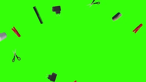 Collection of everyday objects falling against a green screen background Stock Footage 340387165